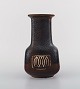 Gunnar Nylund for Rörstrand. Vase in glazed stoneware. Beautiful metallic glaze 
in brown shades. Mid-20th century.
