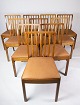 Set of 10 dining room chairs of light wood and upholstered with cognac leather 
from the 1940s. 
5000m2 showroom.
