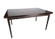 Spisebord i mørk eg med hollandsk udtræk af dansk design fra 1960erne. 
5000m2 udstilling.