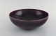 Carl Harry Stålhane (1920-1990) for Rörstrand. Large bowl in glazed ceramics. 
Beautiful glaze in purple shades. Swedish design, mid 20th century.
