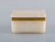 Art deco lidded box in alabaster with brass edge. 1930s.
