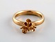 Danish jeweler. Vintage ring in 8 carat gold. Front in the form of a flower. 
Mid-20th century.
