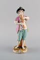 Antique Meissen figure in hand-painted porcelain. Boy playing flute. Marcolini 
period 1774-1814.