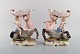 A pair of antique figurative Meissen compotes in hand-painted porcelain. Puti on 
centaur carrying large seashell. Museum quality. Dated 1815-1860.
