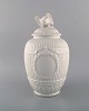 KPM, Berlin. Antique blanc de chine empire lidded vase modeled with garlands and 
eagle. 19th century.
