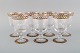 Nason & Moretti, Murano. Syv rødvinsglas i mundblæst kunstglas med håndmalet 
turkis og gulddekoration. 1930