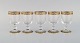 Nason & Moretti, Murano. Five liqueur glasses in mouth-blown art glass with 
hand-painted turquoise and gold decoration. 1930s.
