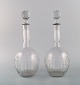Baccarat, France. Two art deco Cavour decanters in mouth blown crystal glass. 
1920s / 30s.
