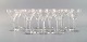 Val St. Lambert, Belgium. 15 white wine glasses in clear mouth blown crystal 
glass. 1930s.
