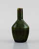 Carl Harry Stålhane for Rörstrand. Vase in glazed ceramics. Beautiful glaze in 
shades of green. Mid-20th century.
