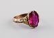 Scandinavian jeweler. Vintage ring in 8 carat gold adorned with purple 
semi-precious stone. Mid-20th century.
