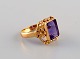 Scandinavian jeweler. Vintage ring in 18 carat gold adorned with large amethyst. 
Mid-20th century.
