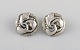 A pair of Georg Jensen ear clips in sterling silver. Design 93. Mid 20th 
century.
