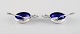Johan Rohde for Georg Jensen. Two Acorn salt vessels in sterling silver with 
royal blue enamel and accompanying spoons. Design 62.
