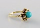 Scandinavian jeweler. Vintage ring in 14 carat gold adorned with light blue 
turquoise. Mid-20th century.
