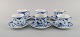 Six Royal Copenhagen Blue Fluted Half Lace coffee cups with saucers. 1980s. 
Model number 1/528.
