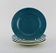 Five Royal Copenhagen / Aluminia Confetti plates in turquoise glazed faience. 
Mid-20th century.
