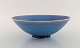 Sven Wejsfelt (1930-2009), Gustavsberg Studiohand. Unique bowl on base in glazed 
ceramics. Beautiful glaze in shades of blue. Dated 1991.
