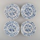 Four antique Meissen Blue Onion lunch plates in hand-painted porcelain. Early 
20th century.
