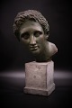 Decorative  bust of the Greek god Hermes with patinated "Bronze" glaze. Height: 
41cm.