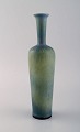 Berndt Friberg (1899-1981) for Gustavsberg Studiohand. Large vase in glazed 
stoneware. Beautiful glaze in shades of blue-green. Dated 1965.

