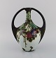 Regina, Holland. Antique art nouveau vase in glazed ceramics with hand-painted 
flowers and foliage. Approx. 1910.
