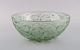 Early René Lalique Pinsons bowl in green and clear mouth-blown art glass. Ca. 
1933.

