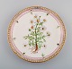 Dinner plate in Flora Danica style. Hand-painted flowers and gold decoration. 
Mid-20th century.
