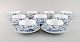 9 Royal Copenhagen Blue Fluted Plain teacups with saucers. Model number 1/76.
