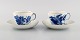 Two Royal Copenhagen Blue Flower Curved coffee cups with saucers with gold edge. 
1960s. Model number 10/1549.
