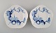 Prof. Heinz Werner for Meissen. Two art nouveau bowls in hand painted porcelain. 
Blue orchid on branch. Dated 1977-78.
