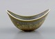 Gunnar Nylund for Rörstrand. Bowl in glazed ceramics. Beautiful eggshell glaze 
in light earth tones. Mid-20th century.
