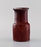 Stig Lindberg for Gustavsberg Studiohand. Vase in glazed ceramics. Beautiful ox 
blood glaze. 1960s.
