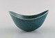 Gunnar Nylund for Rörstrand. Bowl in glazed ceramics. Beautiful speckled glaze 
in blue-green shades. 1960s.
