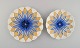 To antikke Meissen tallerkener i håndmalet porcelæn. Blå blomster og 
gulddekoration. Tidligt 1900-tallet.
