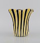 Jean De Lespinasse (1896-1979), France. Unique vase in hand-painted glazed 
ceramics. Striped design in yellow and black shades. Mid-20th century.
