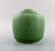 Royal Copenhagen vase in glazed ceramics decorated with swans. Beautiful celadon 
glaze. 1940s.
