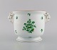 Herend Green Chinese wine cooler in hand-painted porcelain modeled with goats. 
Mid-20th century.
