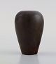 Gunnar Nylund for Rörstrand. Vase in glazed ceramics. Beautiful glaze in brown 
shades. Mid-20th century.
