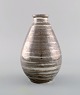 Lucien Brisdoux (1878-1963), France. Art deco vase in glazed stoneware. Striped 
design in white and gray metallic shades. 1930s / 40s.
