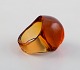 Lalique ring in amber colored art glass. 1980s.
