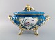 Large Limoges lidded tureen with hand-painted birds in landscape and gold 
decoration. Classic tureen in Sevres style. Dated 1960.
