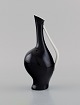 Fritz Heidenreich for Rosenthal. Pregnant Luise orchid vase in black and white 
porcelain. 1950s.

