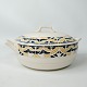Tureen decorated with yellow and blue colours from the 1960s. 
5000m2 showroom.