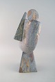 Christina Muff, dansk samtidskeramiker (f. 1971). Stor kubistisk unika skulptur 
i gyldent stentøjsler med silkemat glasur. "Silence is golden".
