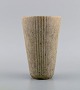 Arne Bang (1901-1983), Denmark. Vase in glazed ceramics. Model number 88. Ribbed 
design with beautiful glaze in sand shades. 1940s / 50s.
