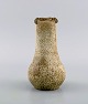 Arne Bang (1901-1983), Danmark. Vase i glaseret keramik. Smuk spættet glasur i 
sand nuancer. 1940/50