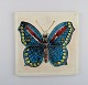Lisa Larson for Gustavsberg. Wall plaque in glazed ceramics with butterfly. 
1970
