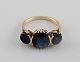 Scandinavian jeweler. Ring in 14 carat gold adorned with three semi-precious 
stones. 1930s.
