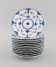 Twelve Royal Copenhagen Blue Fluted Full Lace plates in porcelain. Model number 
1/1088.
